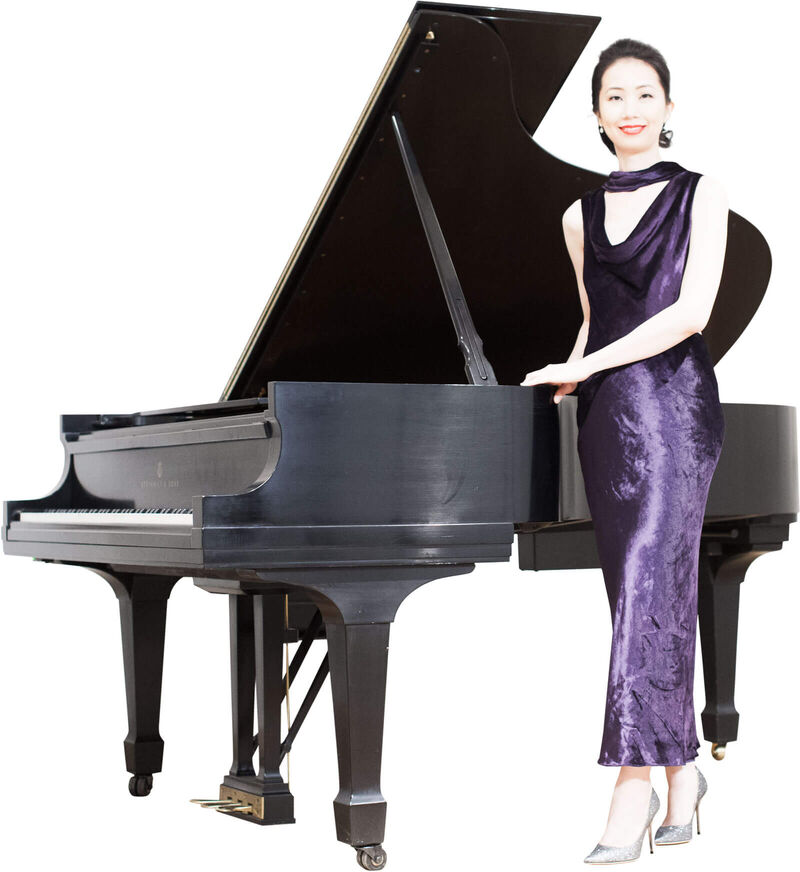 Kyoung Im Kim seated at a grand piano
